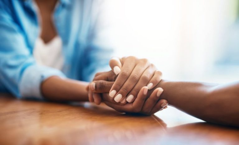 Hands praying together